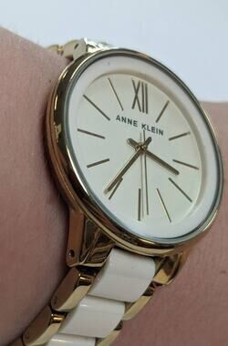 Anne Klein Two Tone White and Golden Sectioned Wrist Watch Roman Numeral